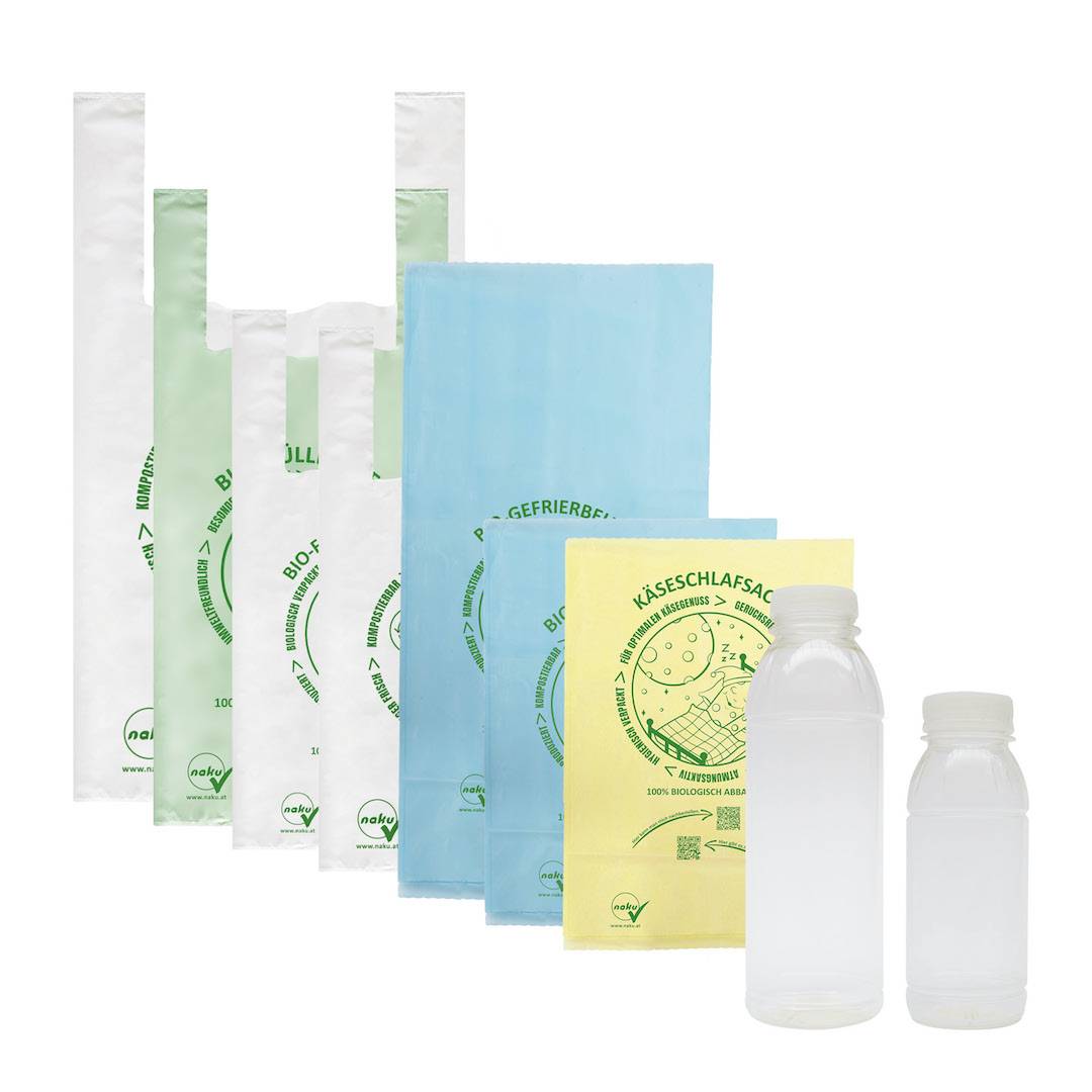 Das NaKu Musterpaket mit unterschiedlichen Biosackerl, Biotüten, Biobeutel und der NaKu Bioflasche in zwei Größen